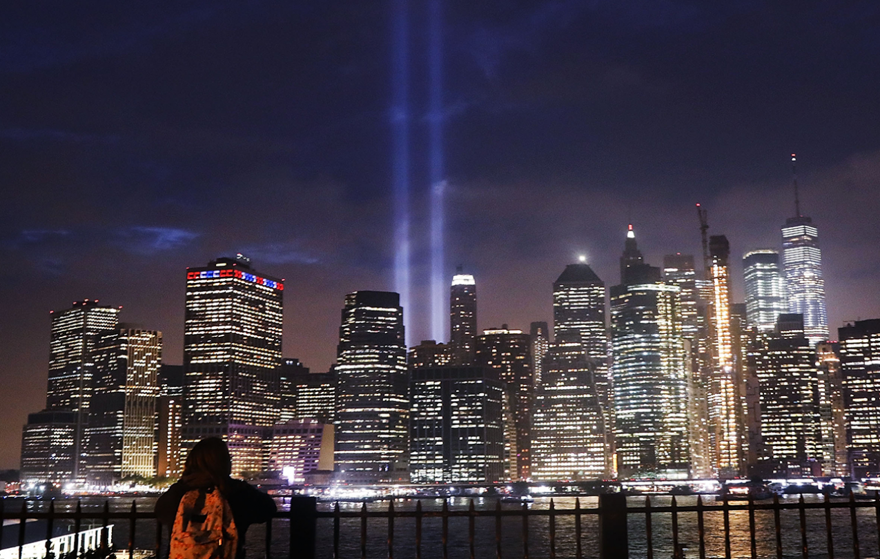 New York skyline with two beams where the twin towers would be